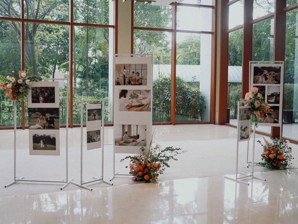 Welcome gallery with floral signage and personal touches at Capella Hotel Singapore.