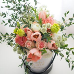 Wild flowers roses floral arrangement bucket