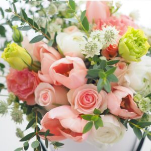 Wild flowers roses floral arrangement bucket