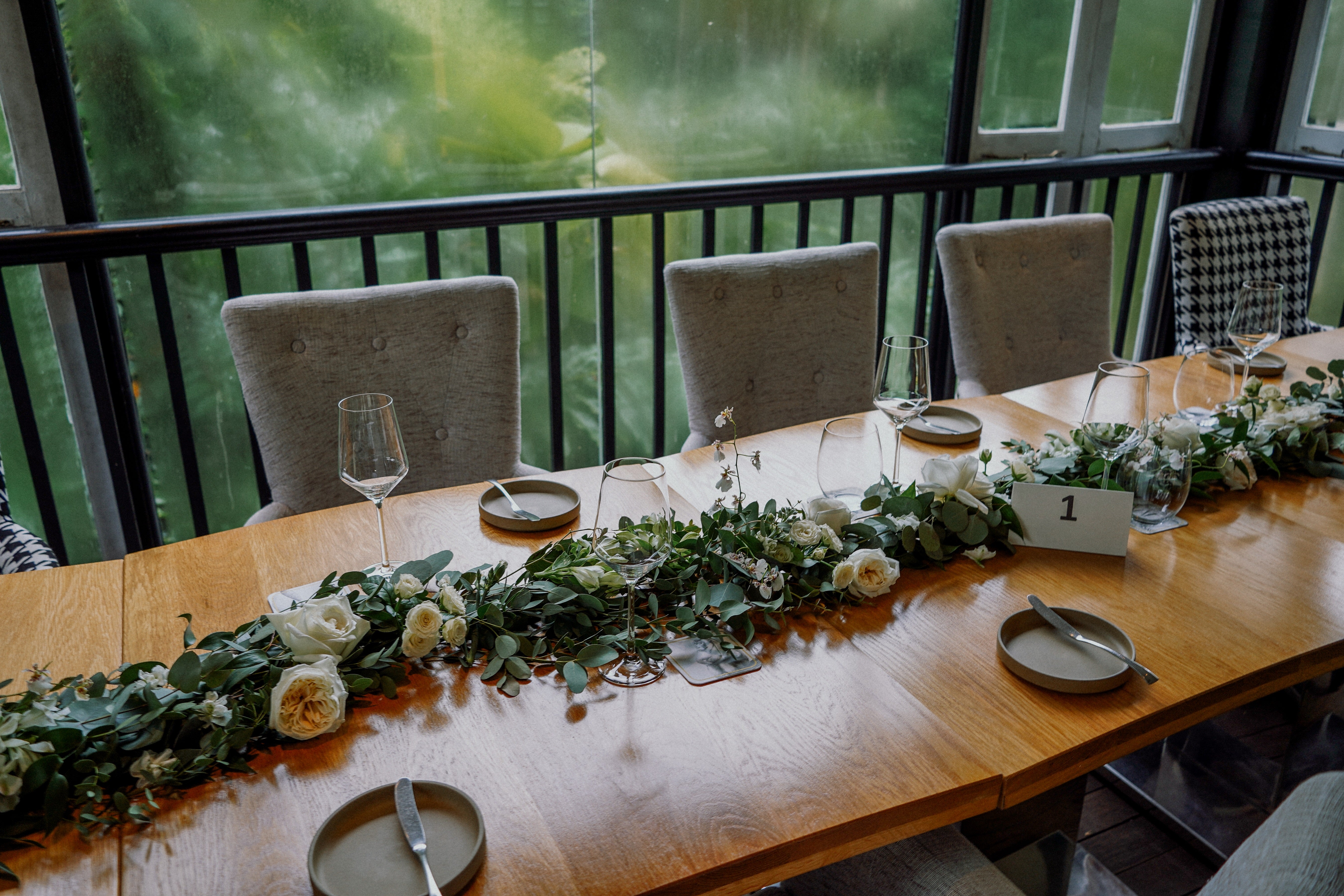 Wedding dinner table set up with long table flower arrangement simple theme decor ideas at The Corner House Michelin star restaurant wedding at Corner House Singapore
