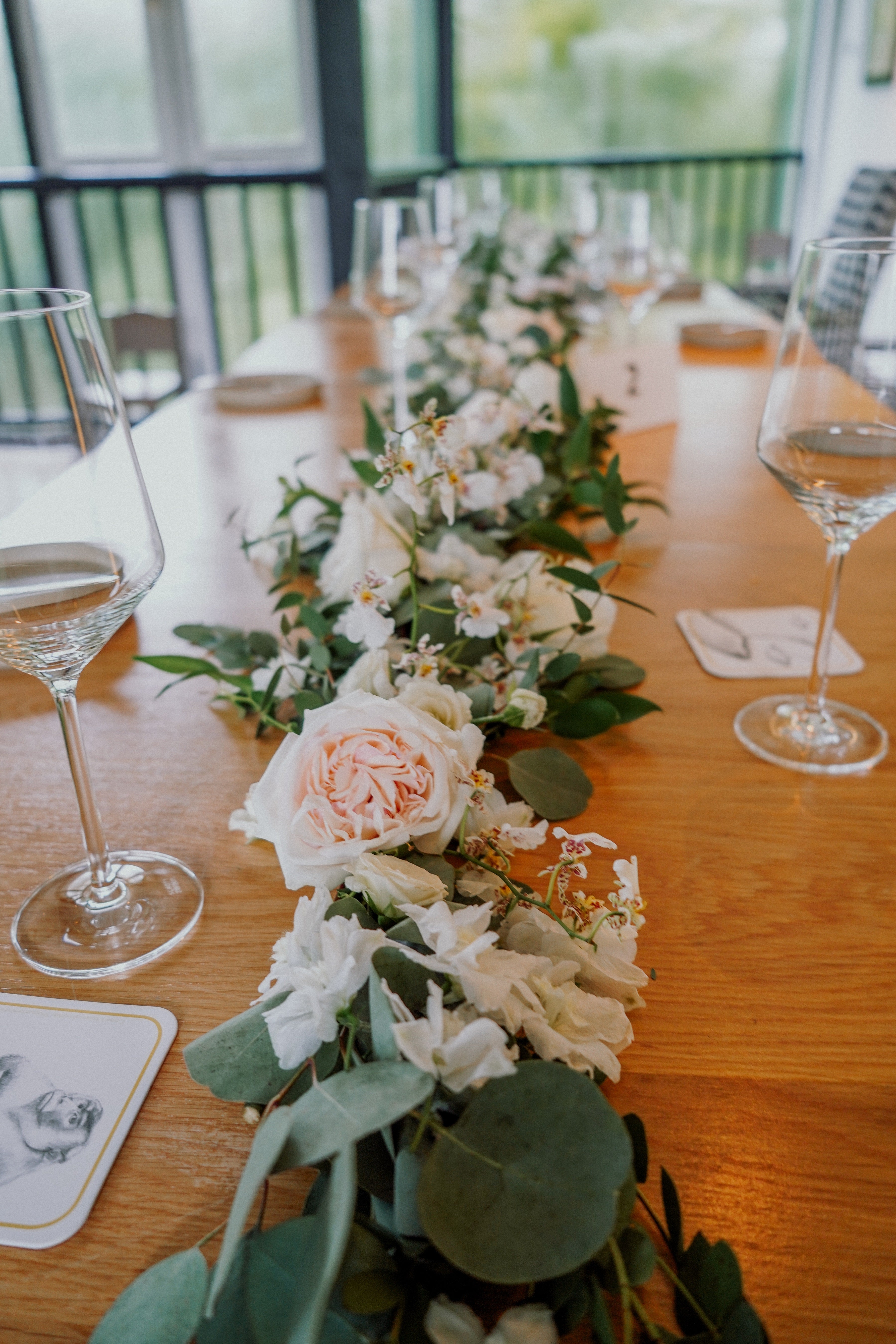 Long table flower setting ideas for low rise dinner table flower arrangement at corner house restaurant for small wedding ceremony celebration ideas at Corner House Singapore