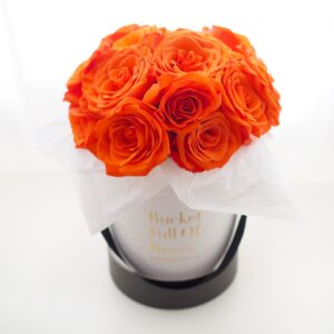 Orange rose floral bucket