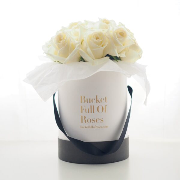 white rose floral bucket