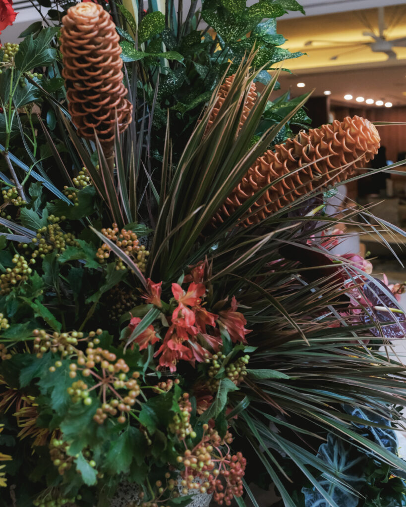 Dense tropical greens with unique textures styled for corporate events at Hotel Michael.