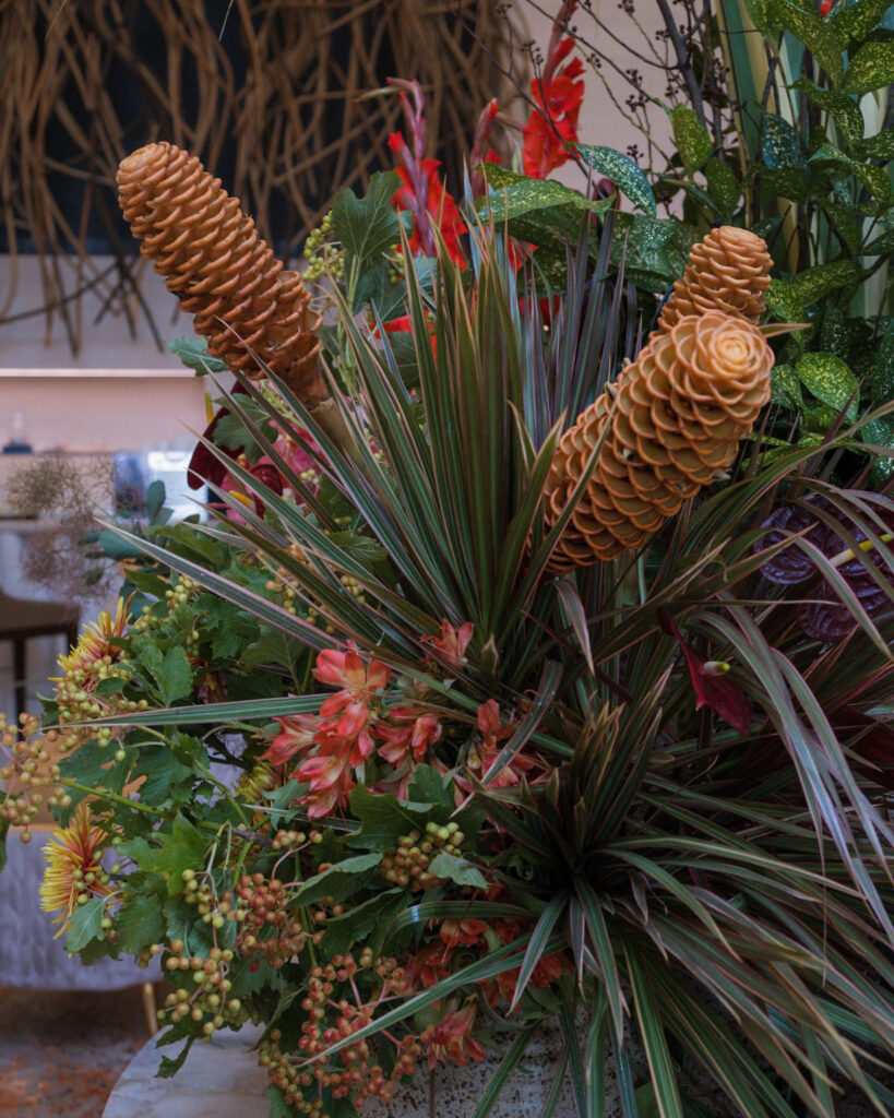 Exotic tropical floral arrangement with pine-cone shaped gingers for bold event styling.