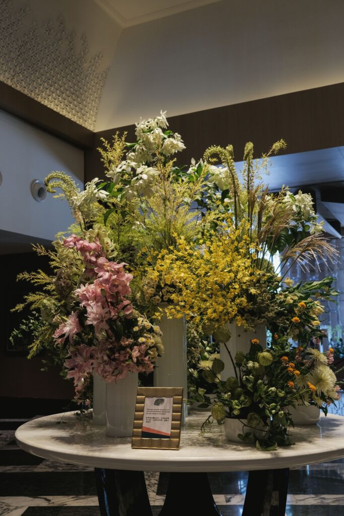 Lush yellow oncidium and cymbidium display adding vibrance to the lobby at Resorts World Sentosa hotel.