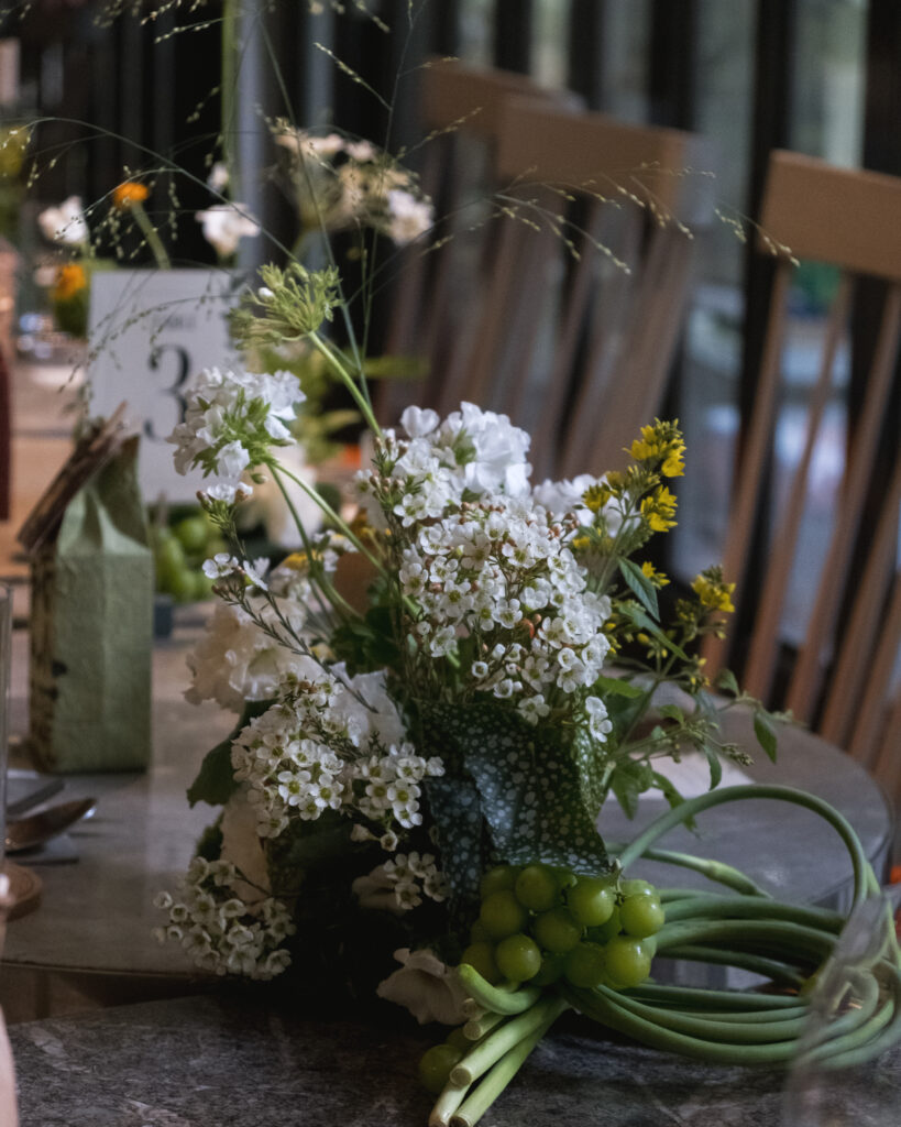 Close-up of table flowers at Open Farm Community