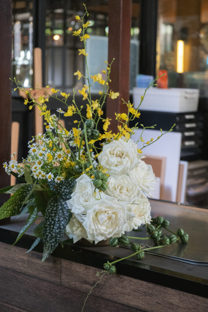 Close-up of table flowers at Open Farm Community